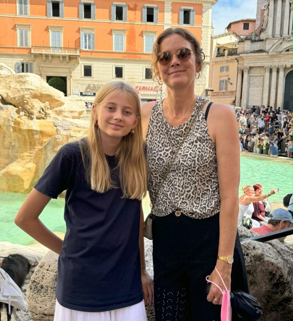 A guide to Rome - busy Trevi Fountain is a must